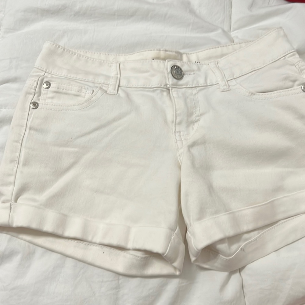 white shorts.